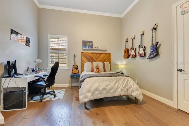 6761 Valhalla Way, Windermere, FL 34786 - bedroom featuring wood finished floors, crown molding, and a desk