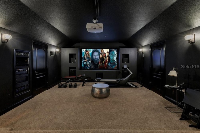 6761 Valhalla Way, Windermere, FL 34786 - cinema room featuring lofted ceiling, carpet, and a textured ceiling