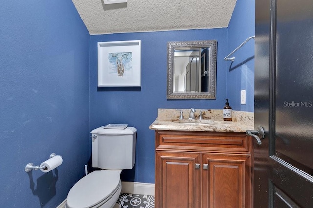 6761 Valhalla Way, Windermere, FL 34786 - bathroom with vanity and a textured ceiling