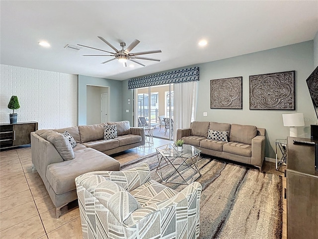 1614 Lima Ave, Kissimmee, FL 34747 - living room with a ceiling fan and light tile patterned floors