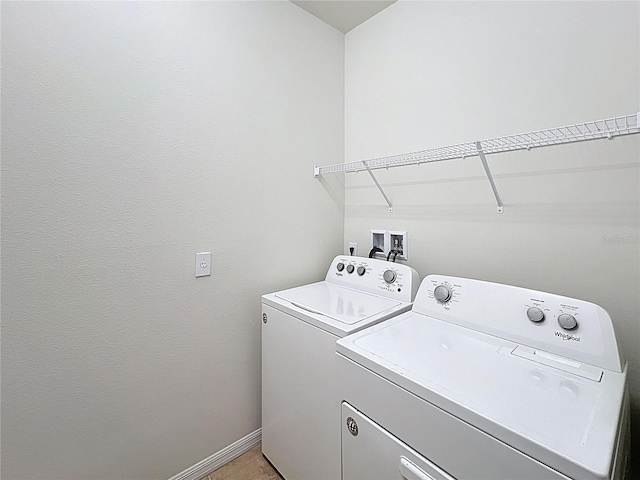 1614 Lima Ave, Kissimmee, FL 34747 - laundry area with independent washer and dryer and baseboards