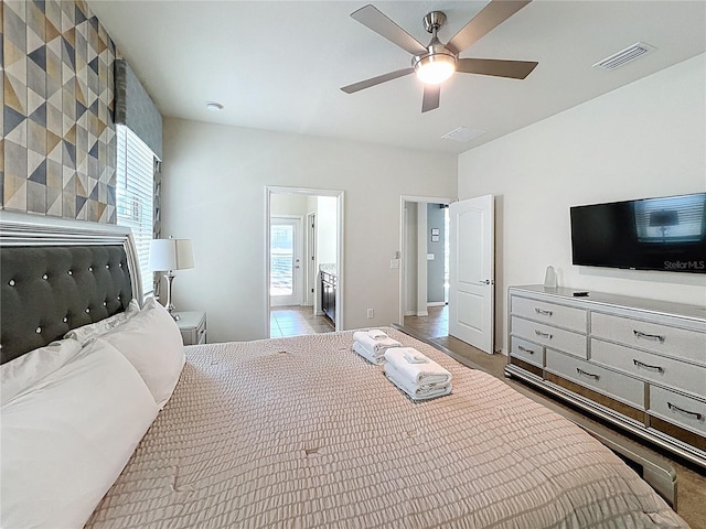 1614 Lima Ave, Kissimmee, FL 34747 - bedroom featuring tile patterned flooring and ceiling fan