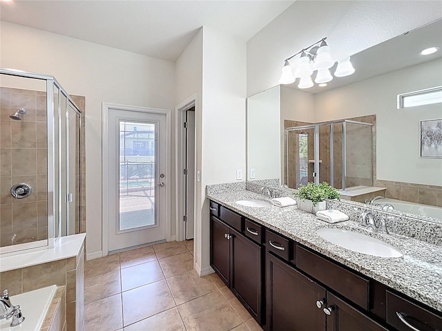 1614 Lima Ave, Kissimmee, FL 34747 - full bathroom featuring a stall shower, healthy amount of natural light, and a garden tub