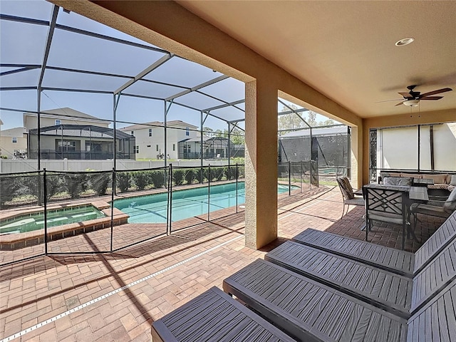 1614 Lima Ave, Kissimmee, FL 34747 - view of swimming pool featuring a patio, a ceiling fan, a residential view, an outdoor hangout area, and a pool with connected hot tub