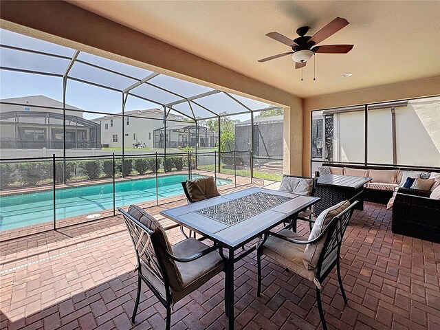 1614 Lima Ave, Kissimmee, FL 34747 - view of patio / terrace with an outdoor hangout area, a ceiling fan, an outdoor pool, a residential view, and outdoor dining area