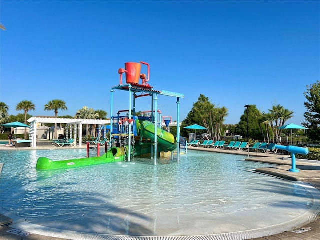 1614 Lima Ave, Kissimmee, FL 34747 - community pool featuring a water play area and a water slide