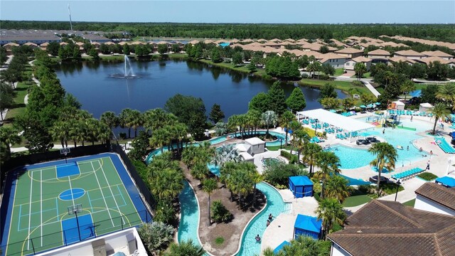 1614 Lima Ave, Kissimmee, FL 34747 - drone / aerial view of a pool and a nearby body of water