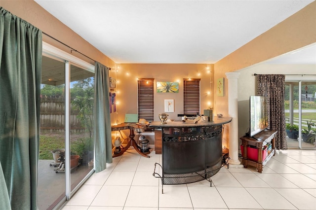303 Thrush Ave, Sebring, FL 33870 - living area with light tile patterned flooring