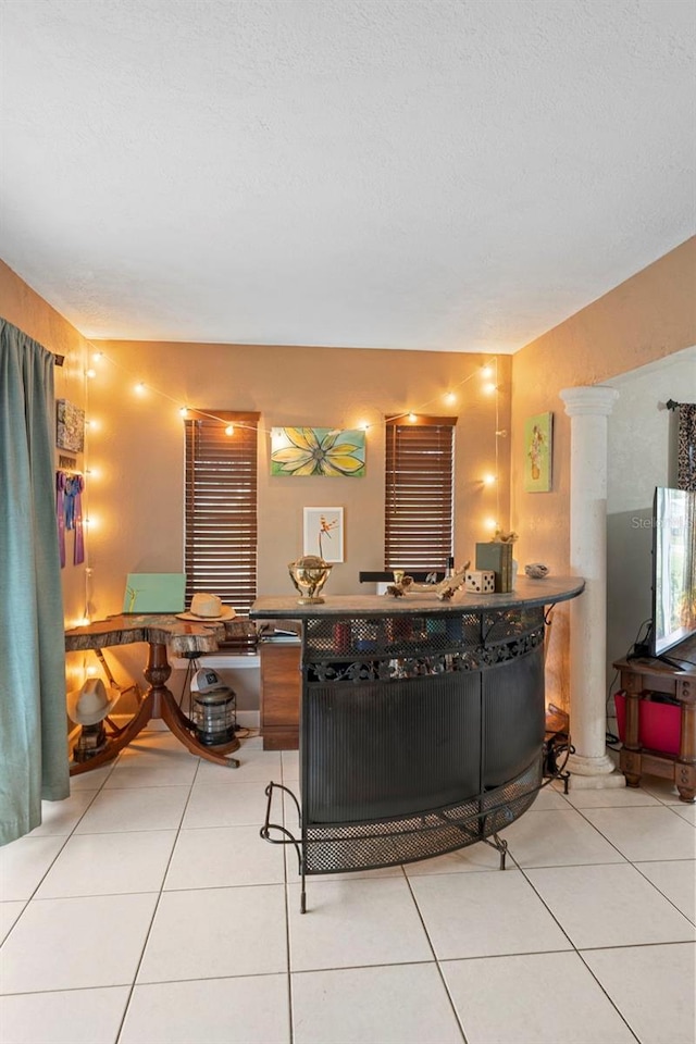 303 Thrush Ave, Sebring, FL 33870 - living area featuring light tile patterned floors