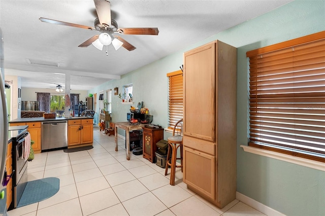 303 Thrush Ave, Sebring, FL 33870 - kitchen featuring stainless steel dishwasher, ceiling fan, range with electric cooktop, dark countertops, and light tile patterned floors