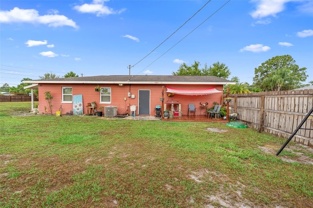 303 Thrush Ave, Sebring, FL 33870 - rear view of property with central AC unit