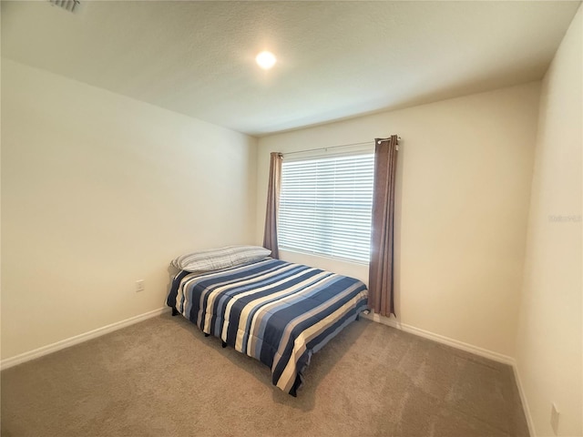 2569 Trinidad Rd, Haines City, FL 33844 - carpeted bedroom featuring baseboards
