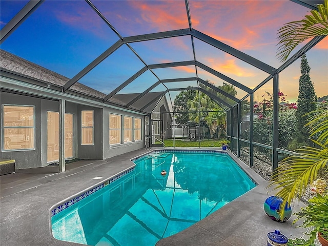 12445 Bohannon Blvd, Orlando, FL 32824 - swimming pool with a patio area and glass enclosure