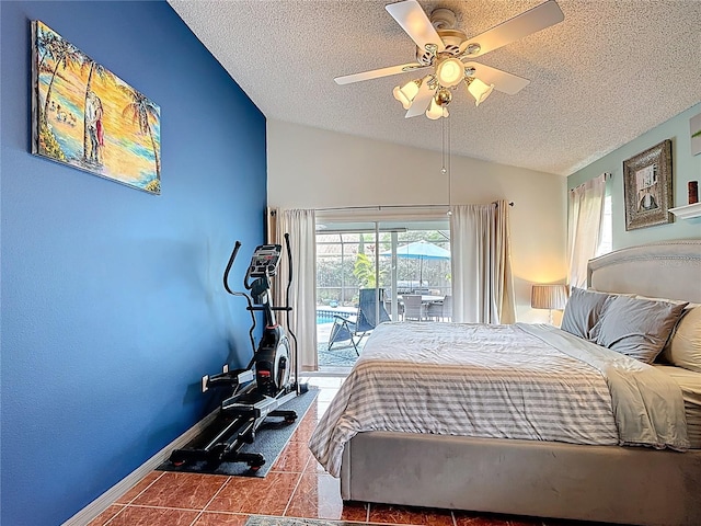 12445 Bohannon Blvd, Orlando, FL 32824 - bedroom featuring lofted ceiling, a textured ceiling, access to outside, a ceiling fan, and baseboards
