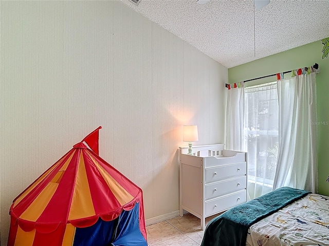 12445 Bohannon Blvd, Orlando, FL 32824 - bedroom with a textured ceiling
