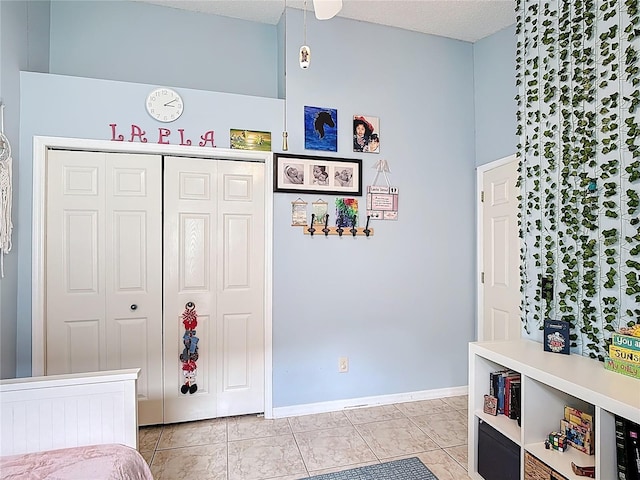 12445 Bohannon Blvd, Orlando, FL 32824 - bedroom featuring baseboards and a closet