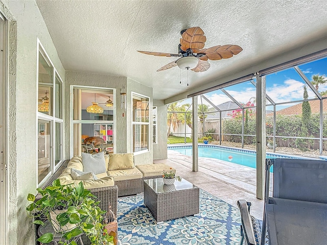 12445 Bohannon Blvd, Orlando, FL 32824 - sunroom / solarium featuring an outdoor living space, ceiling fan, and a swimming pool