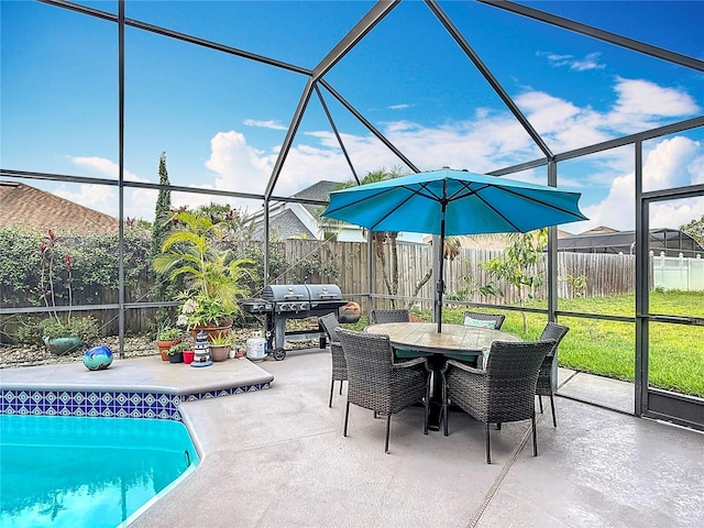 12445 Bohannon Blvd, Orlando, FL 32824 - view of swimming pool with a patio, a grill, a fenced backyard, glass enclosure, and outdoor dining space