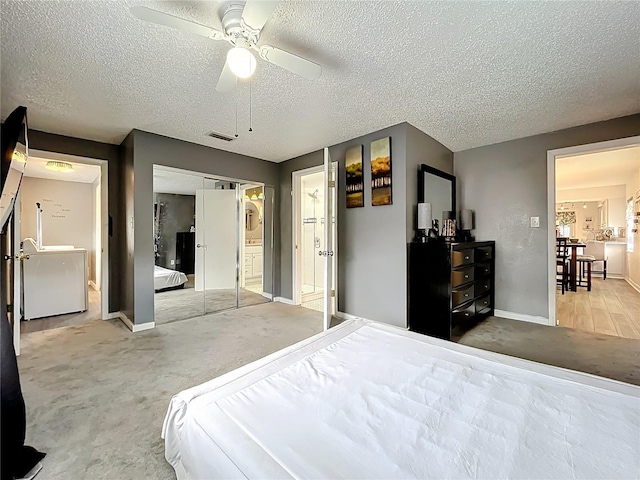 320 S Seminole Ave, Lake Alfred, FL 33850 - bedroom with carpet floors, a textured ceiling, baseboards, and ceiling fan