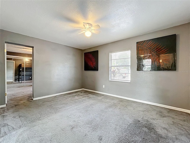 320 S Seminole Ave, Lake Alfred, FL 33850 - empty room featuring a ceiling fan, carpet floors, baseboards, and a textured ceiling