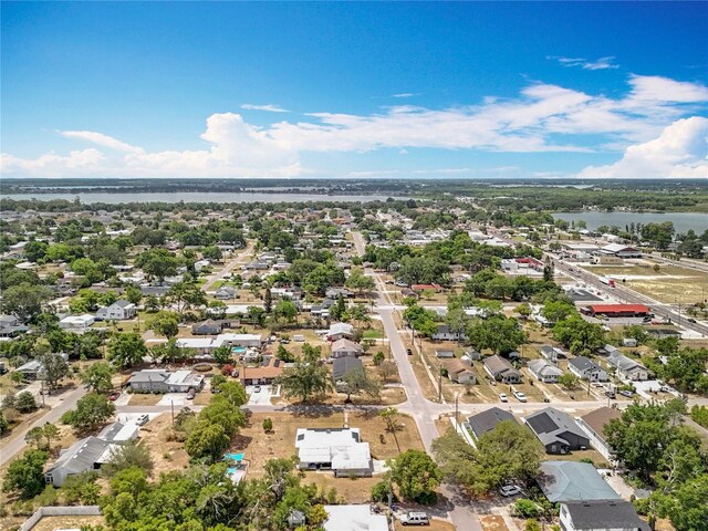 320 S Seminole Ave, Lake Alfred, FL 33850 - aerial perspective of suburban area featuring a large body of water