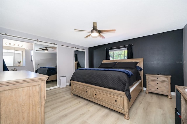 1730 Carolyn Ct, Saint Cloud, FL 34769 - bedroom featuring light wood-type flooring, a ceiling fan, and baseboards