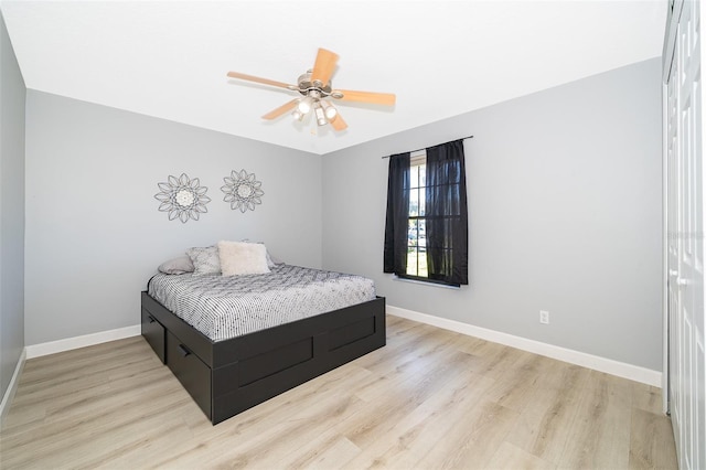 1730 Carolyn Ct, Saint Cloud, FL 34769 - bedroom with wood finished floors, baseboards, and ceiling fan