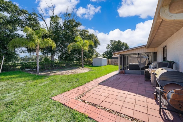 1730 Carolyn Ct, Saint Cloud, FL 34769 - view of yard featuring a shed, a patio, an outdoor structure, and a sunroom