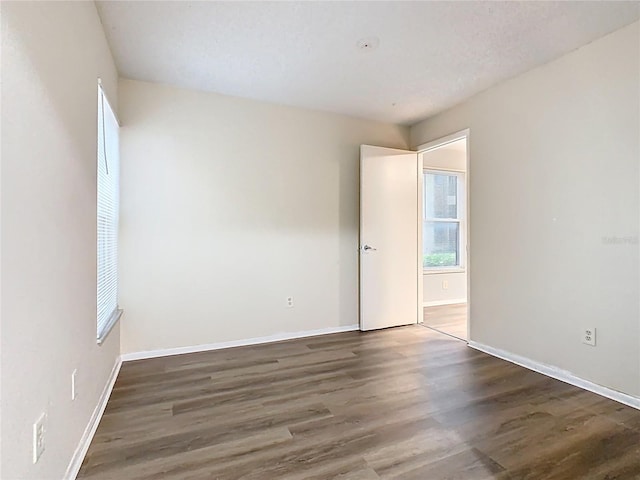 7865 Sugar View Ct Unit 7865, Orlando, FL 32819 - empty room featuring wood finished floors and baseboards