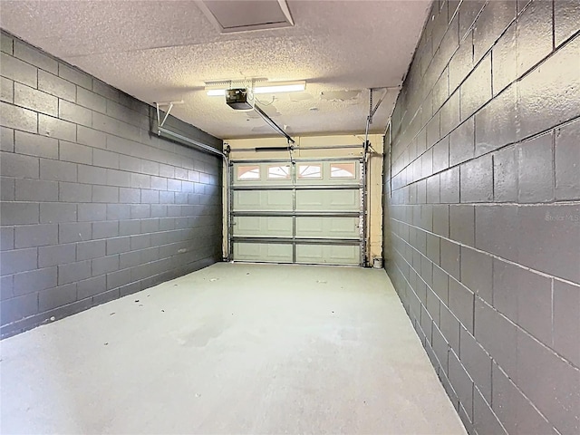 7865 Sugar View Ct Unit 7865, Orlando, FL 32819 - garage with a garage door opener and concrete block wall