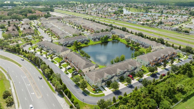 3181 Tocoa Cir, Kissimmee, FL 34746 - aerial view of residential area featuring a nearby body of water and a highway