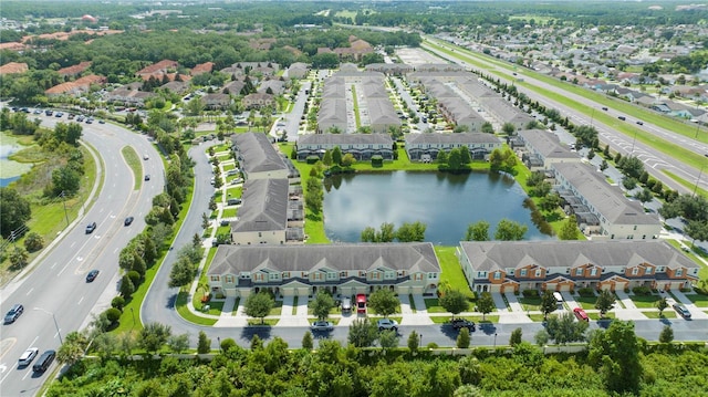 3181 Tocoa Cir, Kissimmee, FL 34746 - aerial perspective of suburban area with a highway and a nearby body of water