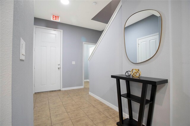 3181 Tocoa Cir, Kissimmee, FL 34746 - foyer with light tile patterned flooring and baseboards