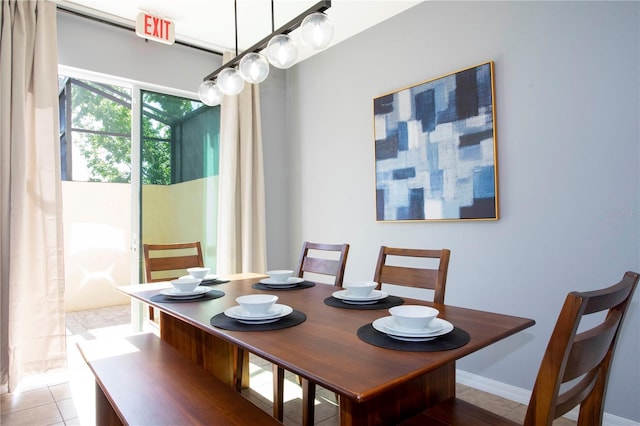 3181 Tocoa Cir, Kissimmee, FL 34746 - dining room with light tile patterned flooring