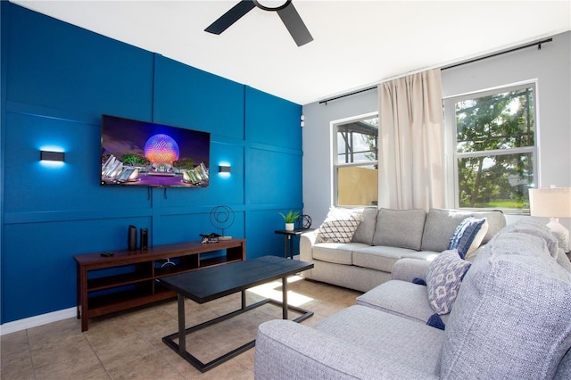 3181 Tocoa Cir, Kissimmee, FL 34746 - living room with ceiling fan and a decorative wall