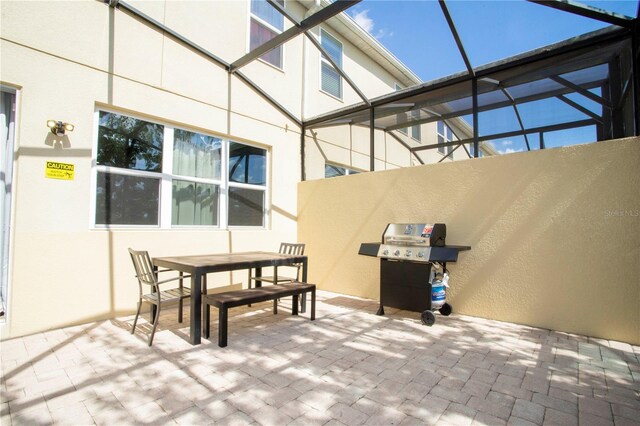 3181 Tocoa Cir, Kissimmee, FL 34746 - view of patio / terrace with outdoor dining area, grilling area, and a lanai