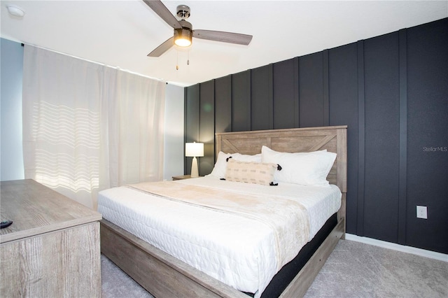 3181 Tocoa Cir, Kissimmee, FL 34746 - carpeted bedroom featuring a decorative wall and a ceiling fan