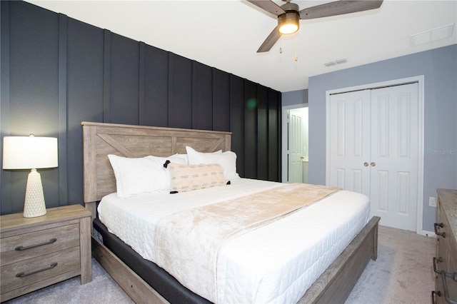 3181 Tocoa Cir, Kissimmee, FL 34746 - bedroom with light carpet, a closet, and a ceiling fan
