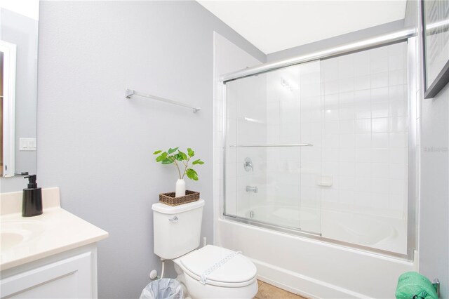 3181 Tocoa Cir, Kissimmee, FL 34746 - full bath with toilet, vanity, and combined bath / shower with glass door