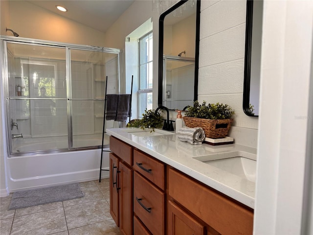 10734 Dawson Lily Way Unit S, Orlando, FL 32832 - full bath with double vanity, combined bath / shower with glass door, tile patterned flooring, and recessed lighting