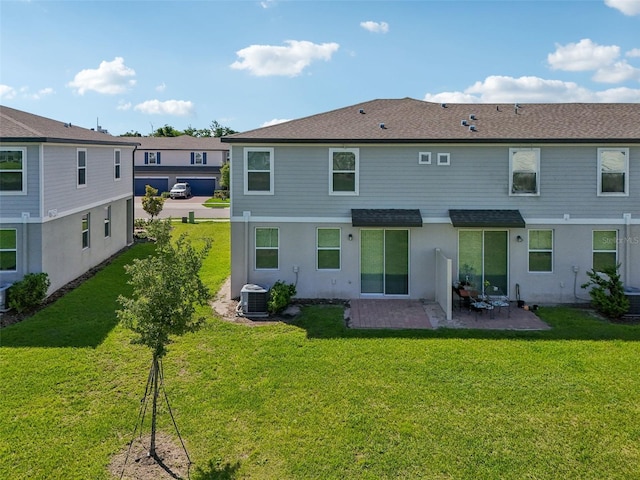 2462 Sweet Viburnum Way, Ocoee, FL 34761 - rear view of property with a patio area, central AC, a lawn, and stucco siding