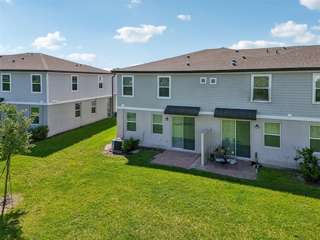 2462 Sweet Viburnum Way, Ocoee, FL 34761 - back of property with a patio, a lawn, stucco siding, and roof with shingles