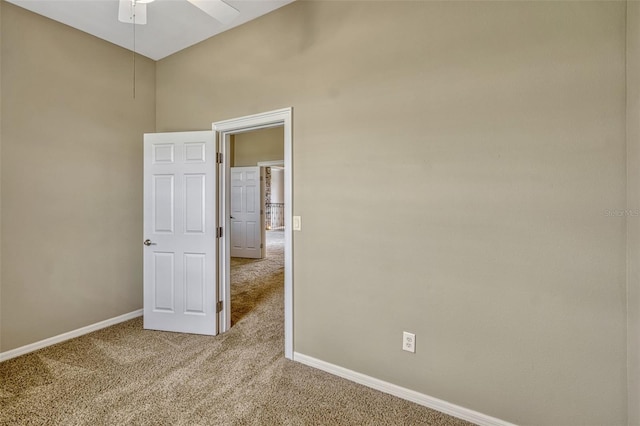 2350 Bradbury Rd, Haines City, FL 33844 - carpeted empty room featuring baseboards and a ceiling fan