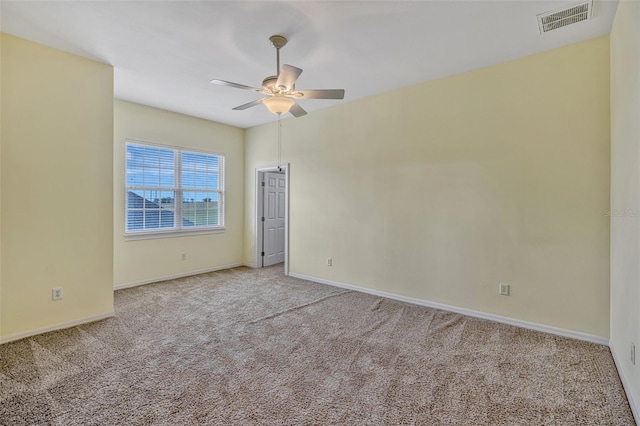2350 Bradbury Rd, Haines City, FL 33844 - empty room featuring light colored carpet, a ceiling fan, and baseboards