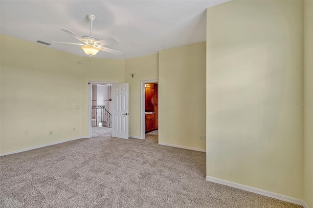 2350 Bradbury Rd, Haines City, FL 33844 - spare room featuring light carpet, ceiling fan, and baseboards