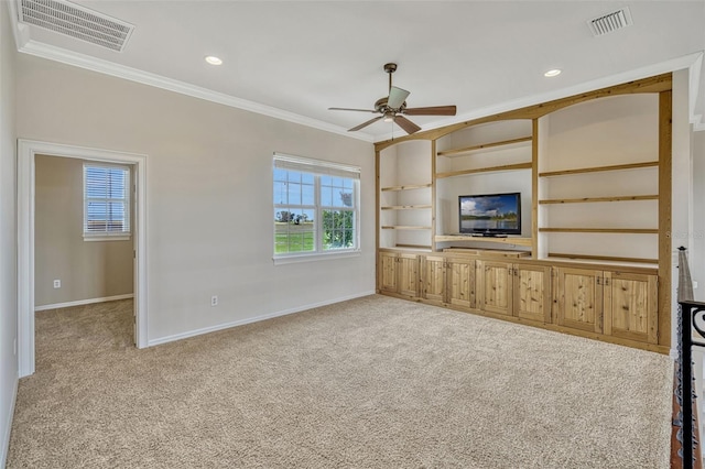 2350 Bradbury Rd, Haines City, FL 33844 - unfurnished living room with ornamental molding, carpet, baseboards, a ceiling fan, and built in shelves