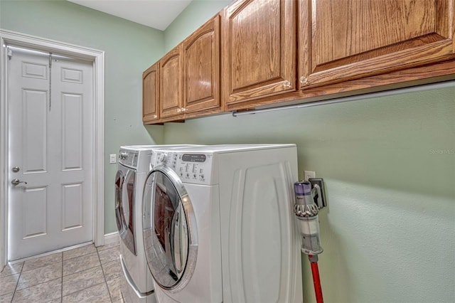 2350 Bradbury Rd, Haines City, FL 33844 - laundry room featuring cabinet space, independent washer and dryer, and baseboards