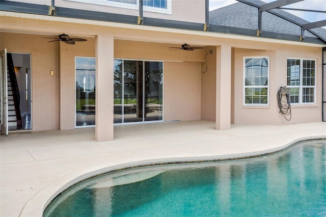 2350 Bradbury Rd, Haines City, FL 33844 - outdoor pool with ceiling fan, a patio area, and glass enclosure