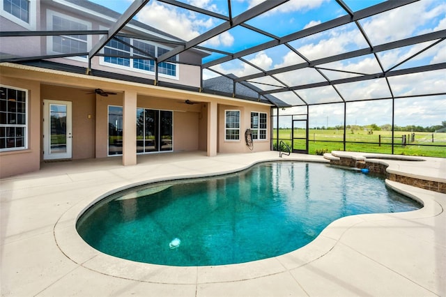 2350 Bradbury Rd, Haines City, FL 33844 - swimming pool with ceiling fan, a patio, and glass enclosure