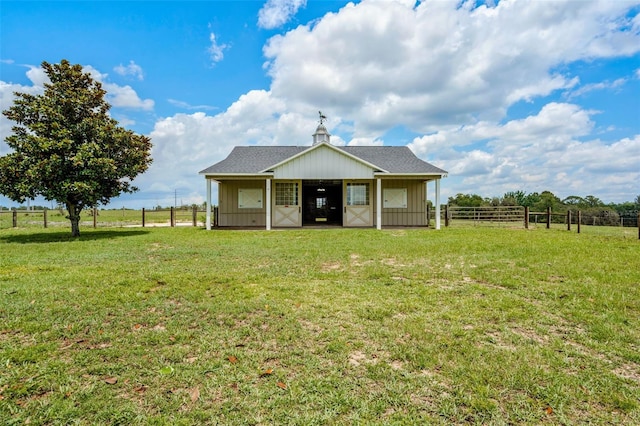 2350 Bradbury Rd, Haines City, FL 33844 - back of property featuring an outdoor structure and an exterior structure